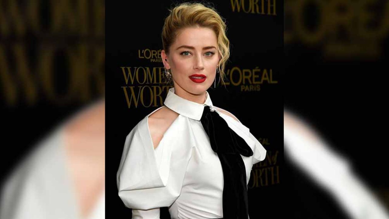 Captan a Amber Heard, ex de Johnny Depp, en apasionado beso con mujer