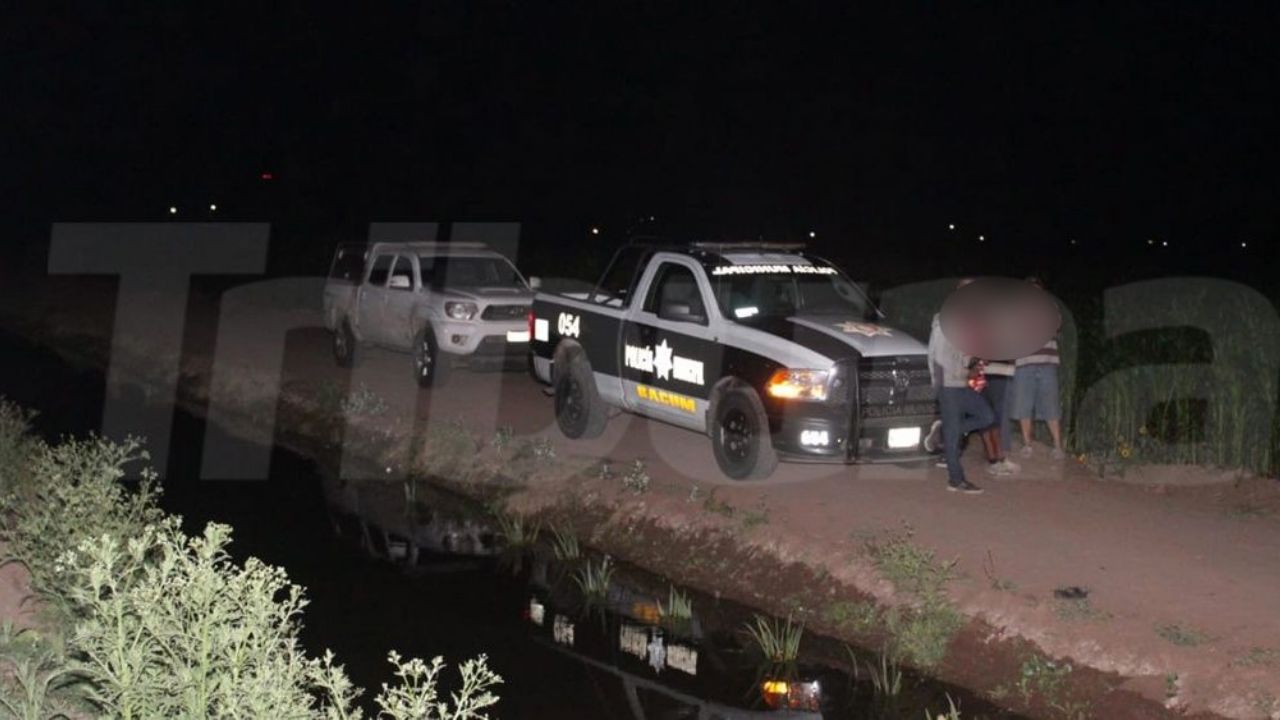 Encuentran a sujeto sin vida y con signos de violencia en canal de riego