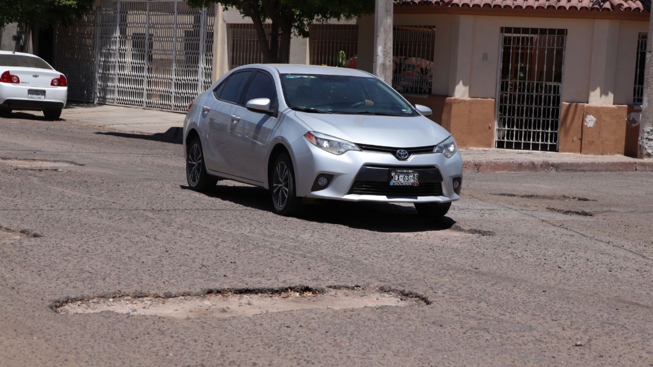 AMLO dará apoyo para bacheo; 70% de las calles en Cajeme están dañadas