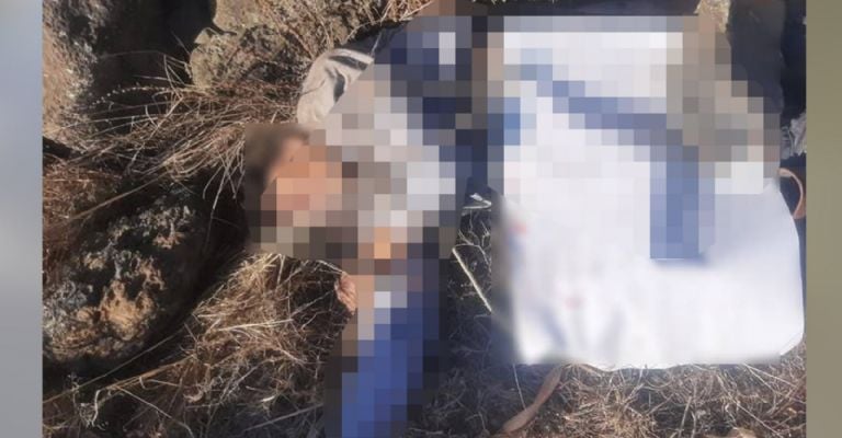 Encuentran cuerpo con cartulina