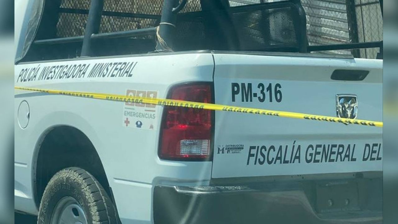 Autoridades llegan al sitio del crimen