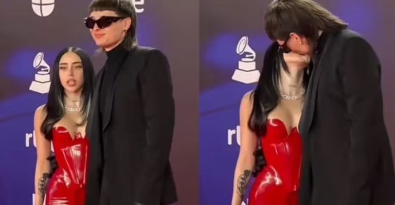 Nicki Nicole y Peso Pluma besándose en la alfombra roja