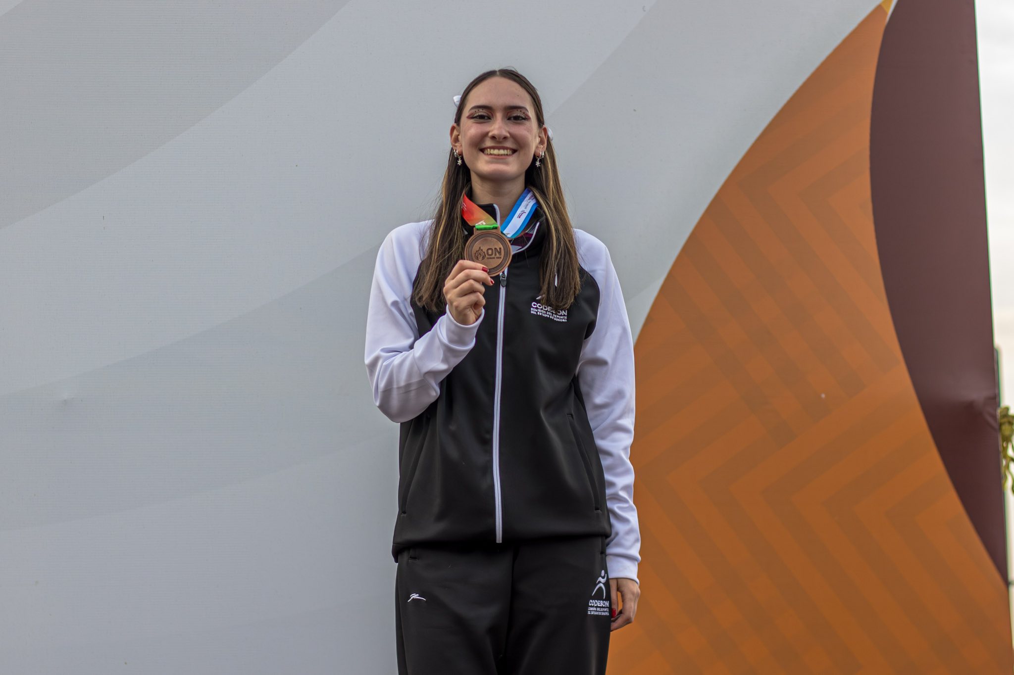Urías con su medalla