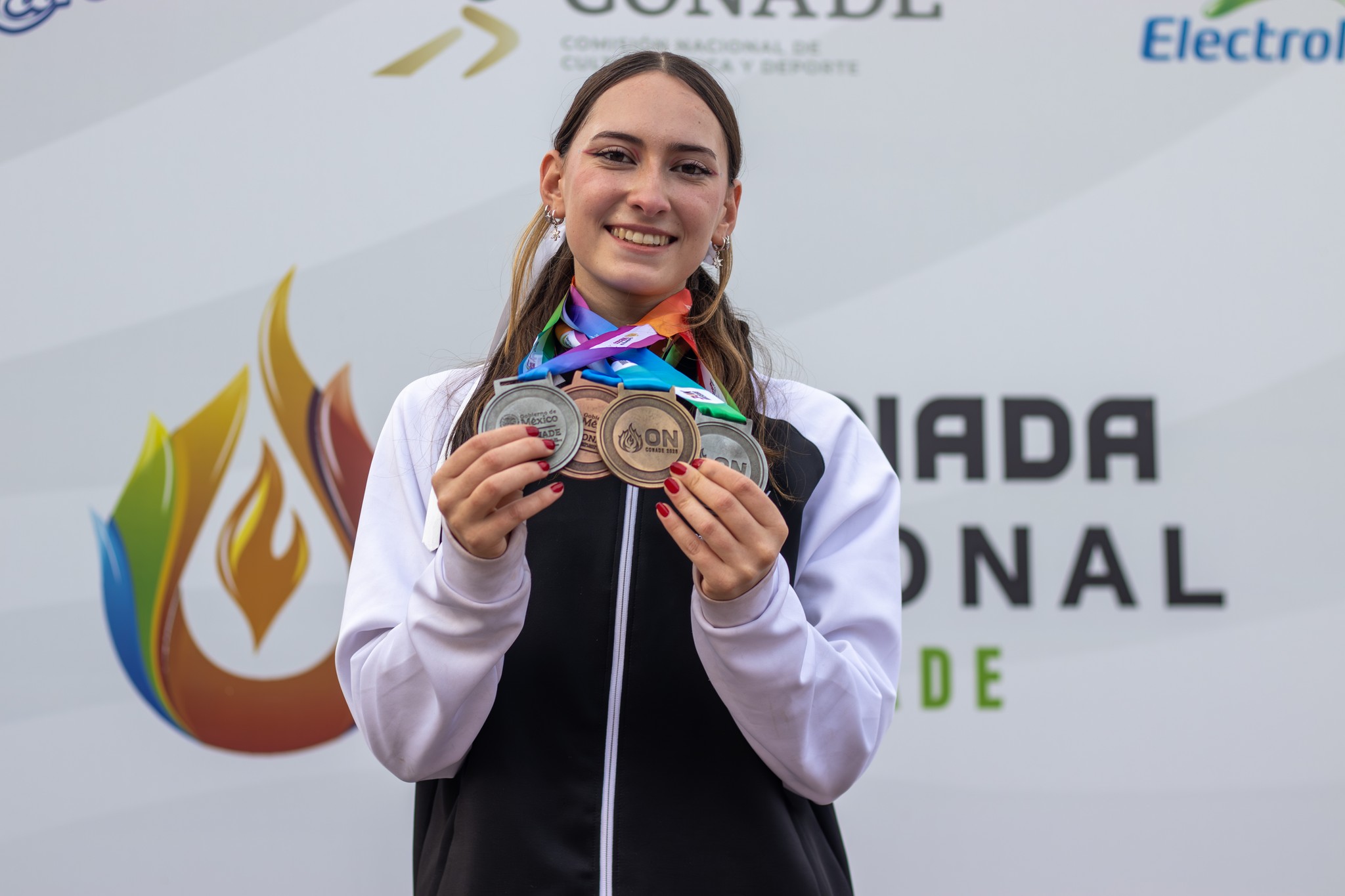 Urías con sus medallas